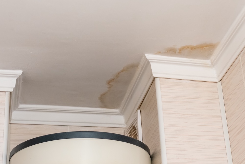 Attic AC Drain Leaks: How a Small Summer Clog Can Lead to Ceiling Collapse